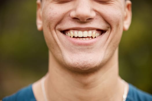 Closeup, smile and mouth of a man on bokeh for oral hygiene, tooth cleaning and dentistry. Happy, face and a person showing results or progress of teeth whitening or dental care from a treatment