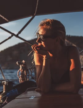 Attractive woman on the sailboat