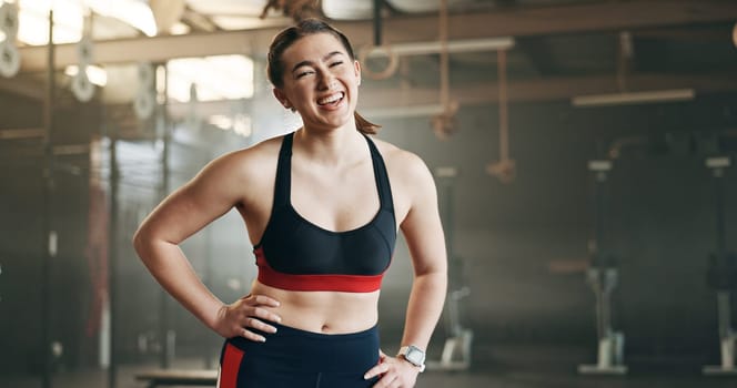 Gym, face and happy woman with positive attitude, mindset and laughing after training routine. Portrait, smile and lady athlete at sports center confident, ready and enjoy fitness or health lifestyle