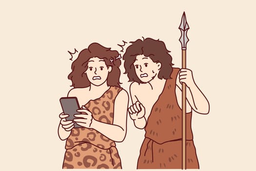 Ancient people with mobile phone in hands marvel at technology from future during random time travel