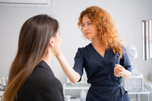 Women at appointment in aesthetic clinic