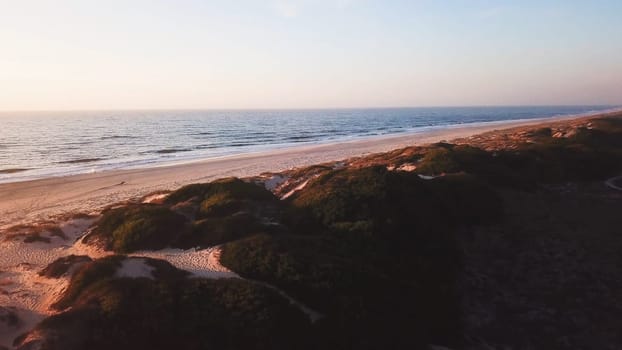 Aerial view of beach at sunset