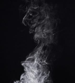 Incense, steam or gas in a studio with dark background by mockup space for magic effect with abstract. Fog, smoke or vapor mist moving in air for cloud smog pattern by black backdrop with mock up.