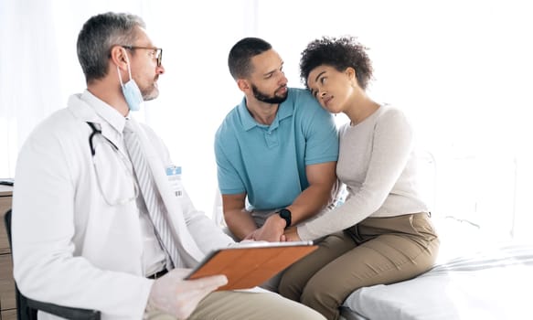 Doctor consultation, problem and couple sad over bad online results, gynecology news or medicine healthcare fail. Clinic gynecologist, marriage people or medical surgeon support, help or empathy care