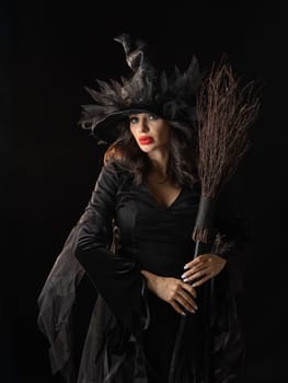 Charming halloween witch with broom