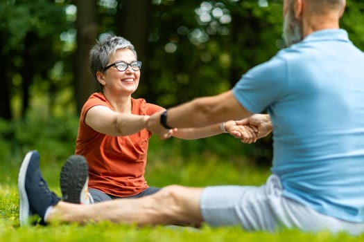 Sport Activities For Seniors. Portrait Of Older Couple Training Together Outdoors