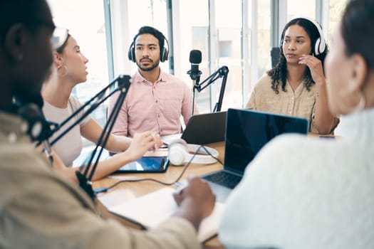 Discussion, podcast speaker and group of people, team or circle of presenter consulting, speaking and chat on talk show. Radio, audio and influencer listening, attention or interview on media network
