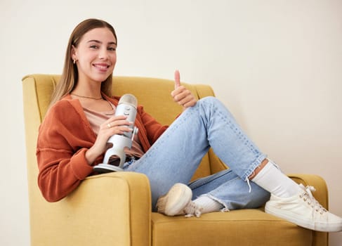 Woman, microphone and podcast, influencer with thumbs up, media broadcast with feedback and communication. Talk show, chat and live streaming with presenter and hand gesture, support and portrait