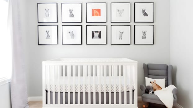 Bright white minimalist nursery wall with frames above cradle. Neural network generated in May 2023. Not based on any actual person, scene or pattern.