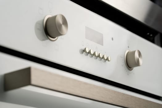Modern oven mode control button close up