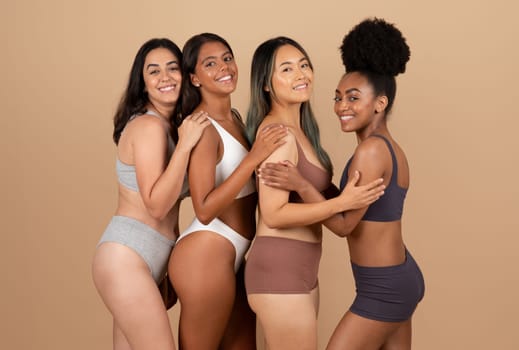 Diverse young ladies in underwear, embracing natural beauty
