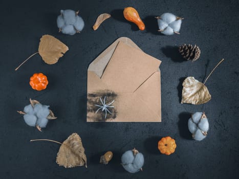 Craft envelope with halloween decor on black.