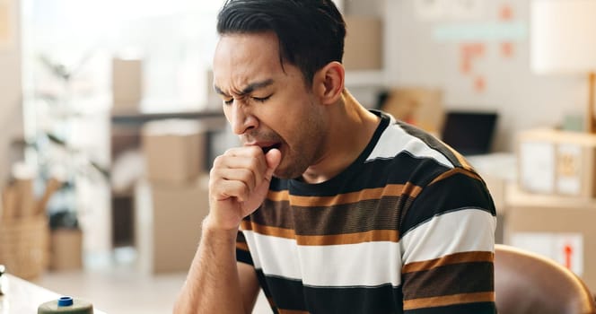 Yawning, man and tired with shipping small business, delivery company and brain fog with company owner. Exhausted, burnout and inventory check, supply chain and overtime with overworked worker