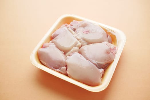 raw breast chicken meat in a plastic packet