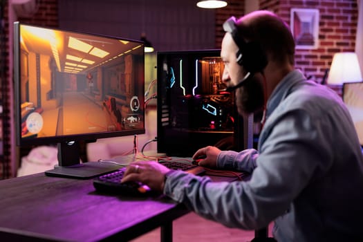 Gamer using gaming computer