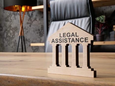 Legal assistance concept. The sign is on the table.