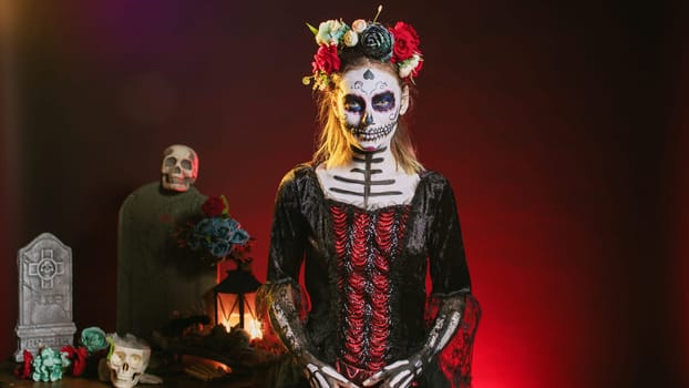 Spooky goddess of death with skull make up and horror