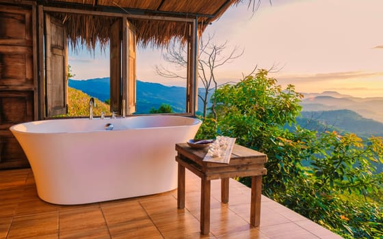 bathtub looking out over the mountains of Chiang Rai Northern Thailand