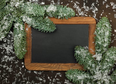 Vintage black chalkboard with Christmas decoration