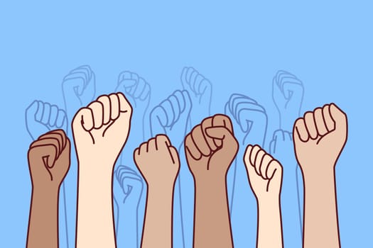 Hands diverse people raising fists in protest and calling for revolution to fight social injustice
