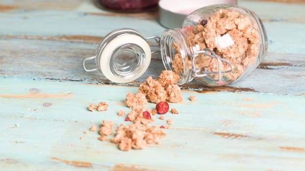 Glass jar with healthy breakfast cereal 