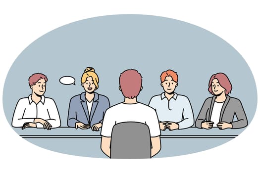 Male candidate at interview in office