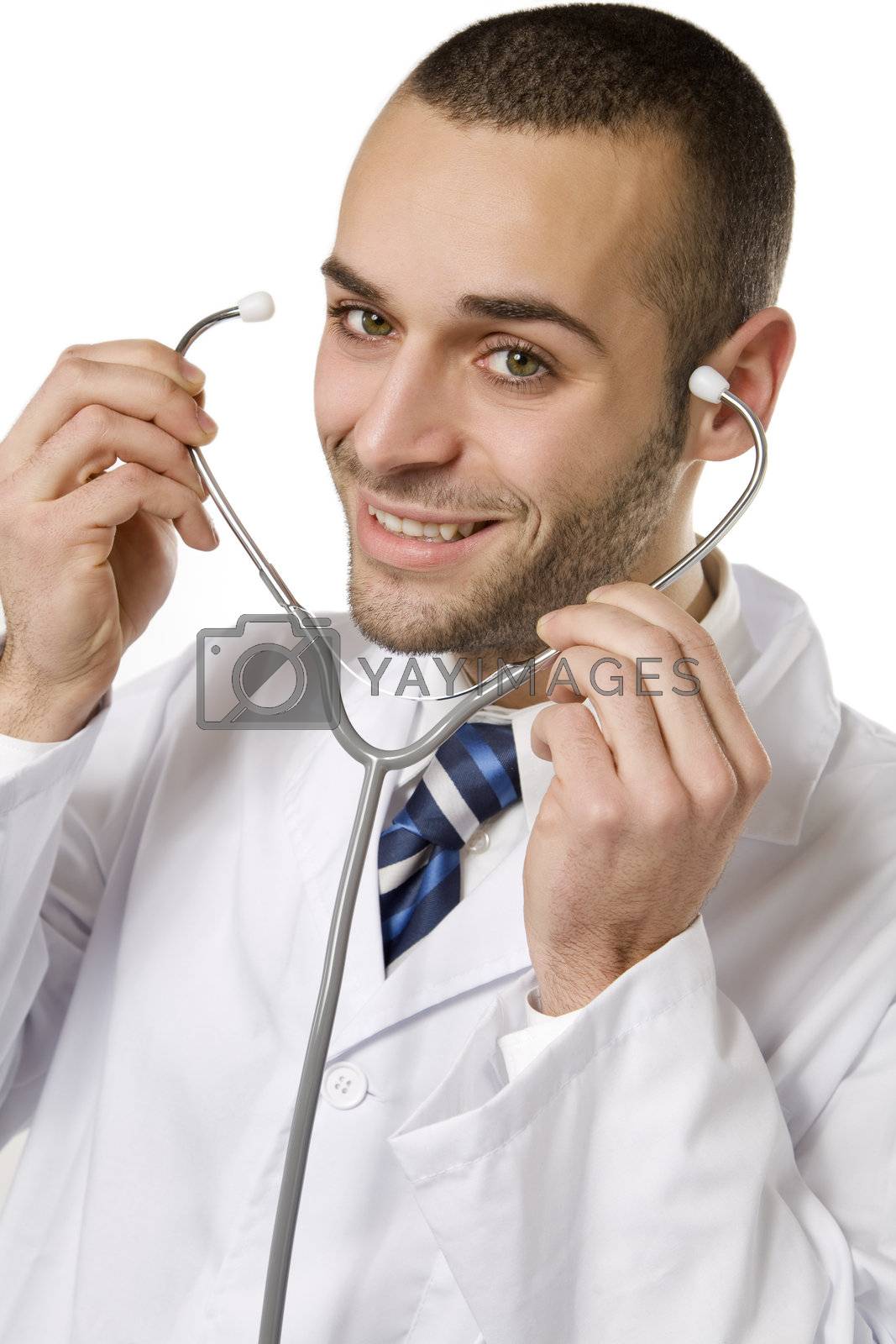 healthcare and medicine: young doctor using a stethoscope