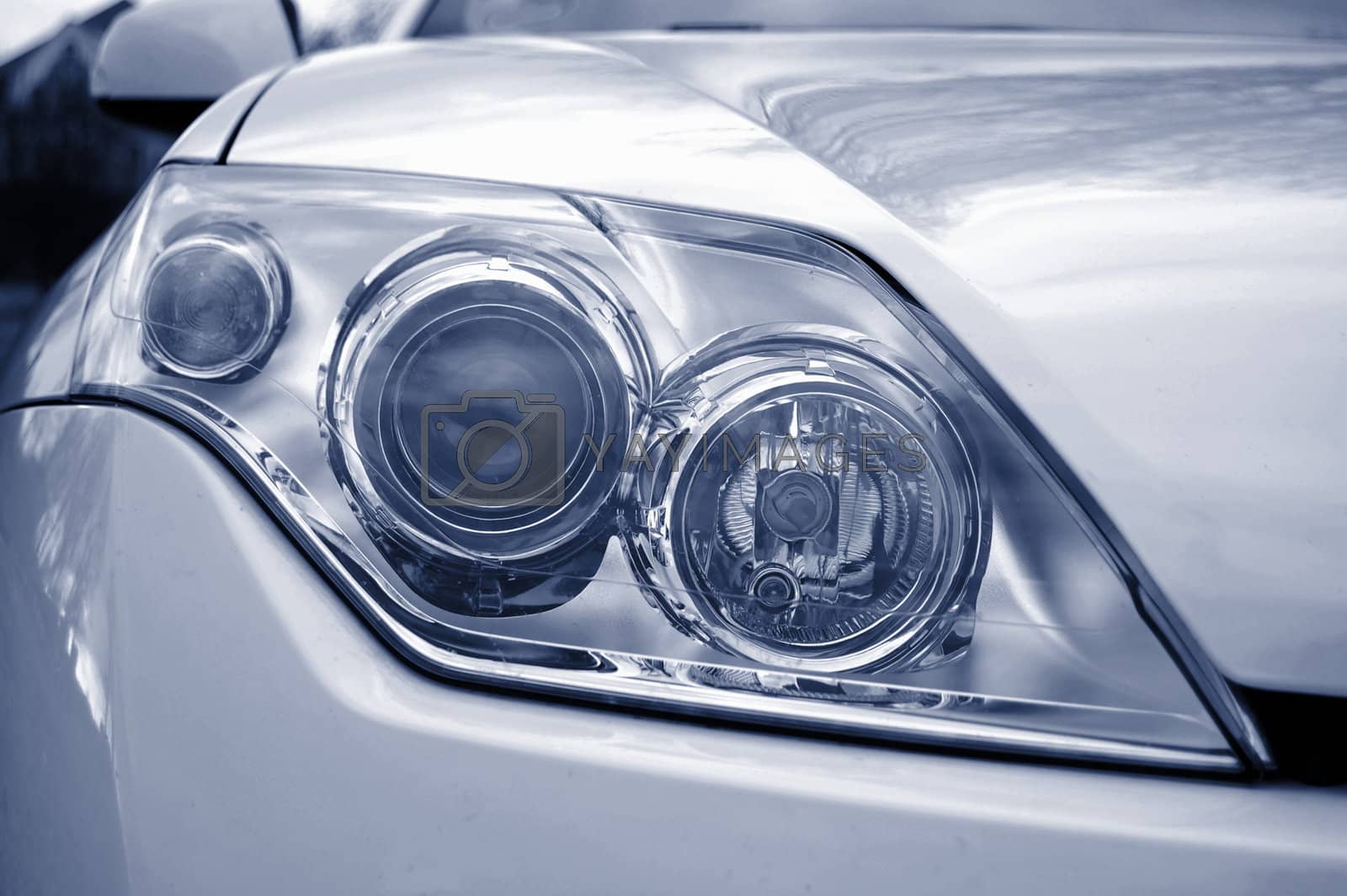 Royalty free image of headlight of a car by gunnar3000