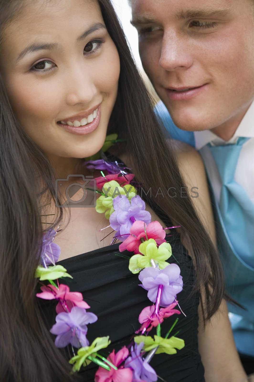 Royalty free image of Couple Wearing Leis by moodboard