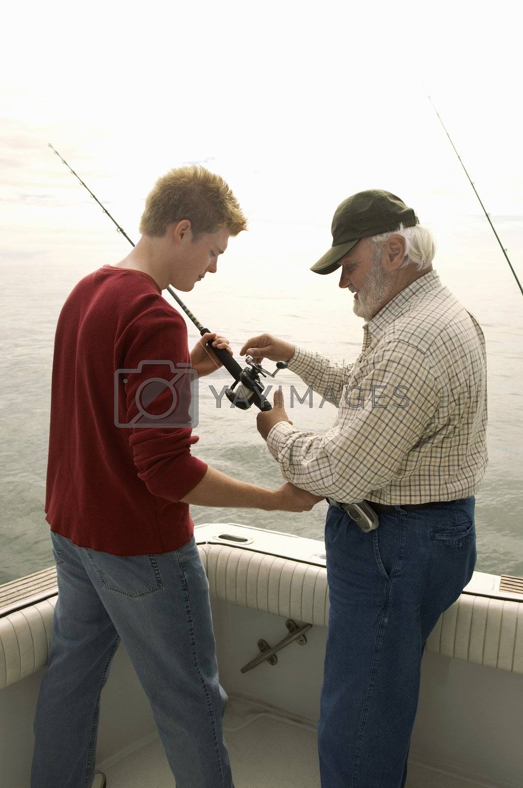 Royalty free image of Father and Son Fishing by moodboard