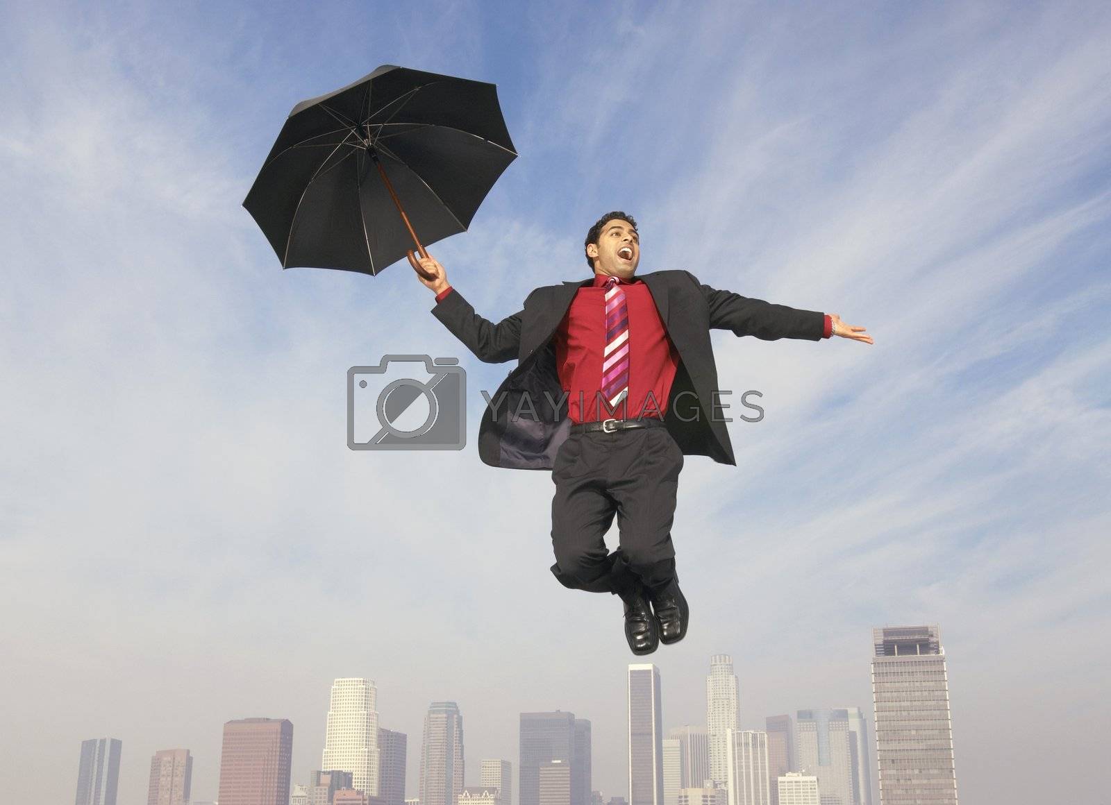 Royalty free image of Falling Businessman with Umbrella by moodboard