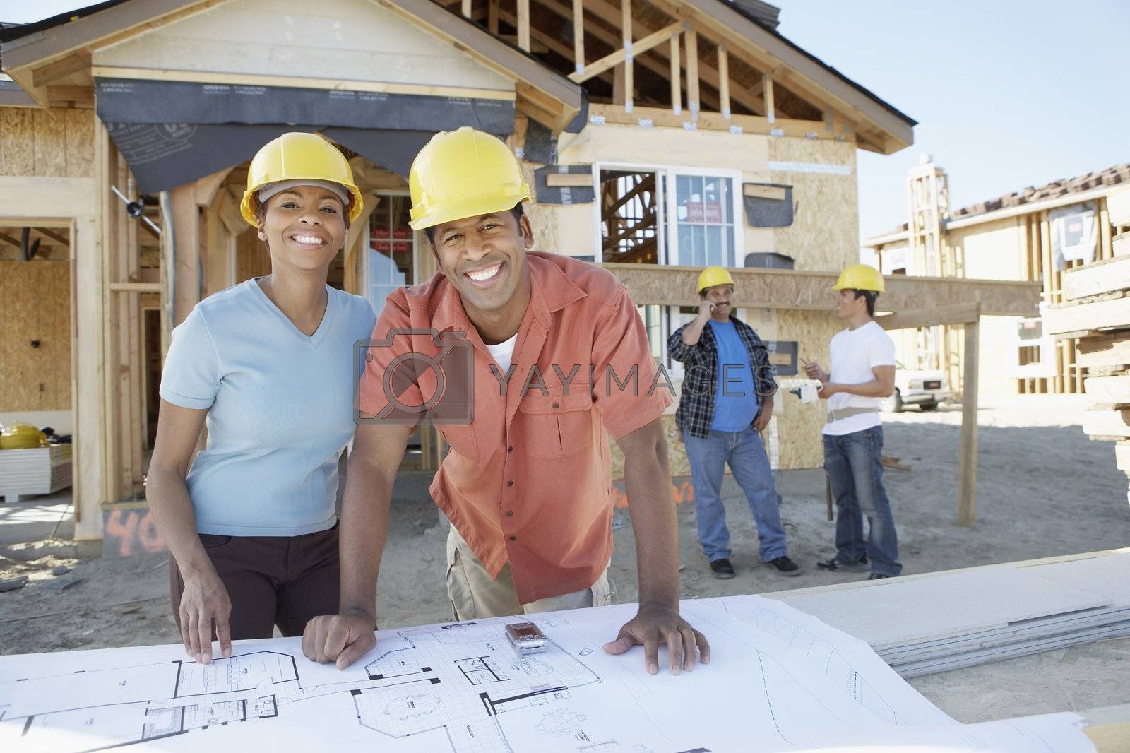 Royalty free image of Couple Having Their House Built by moodboard