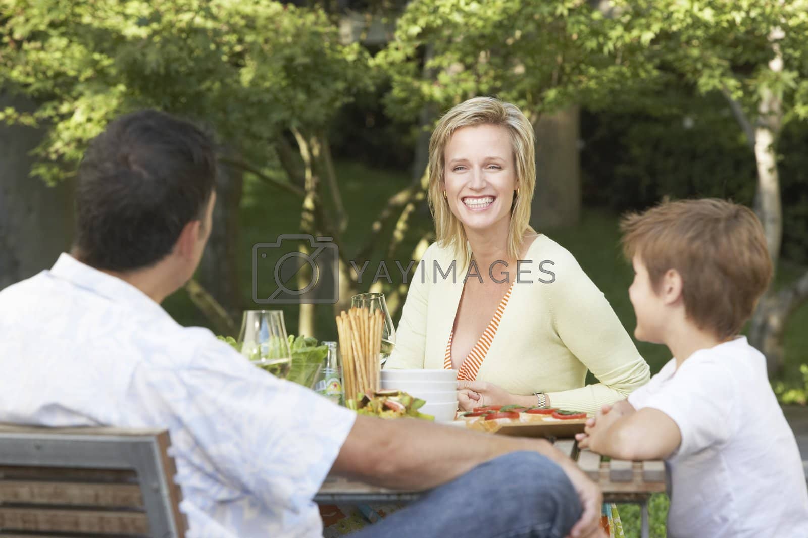 Royalty free image of Enjoying a Meal Outdoors by moodboard