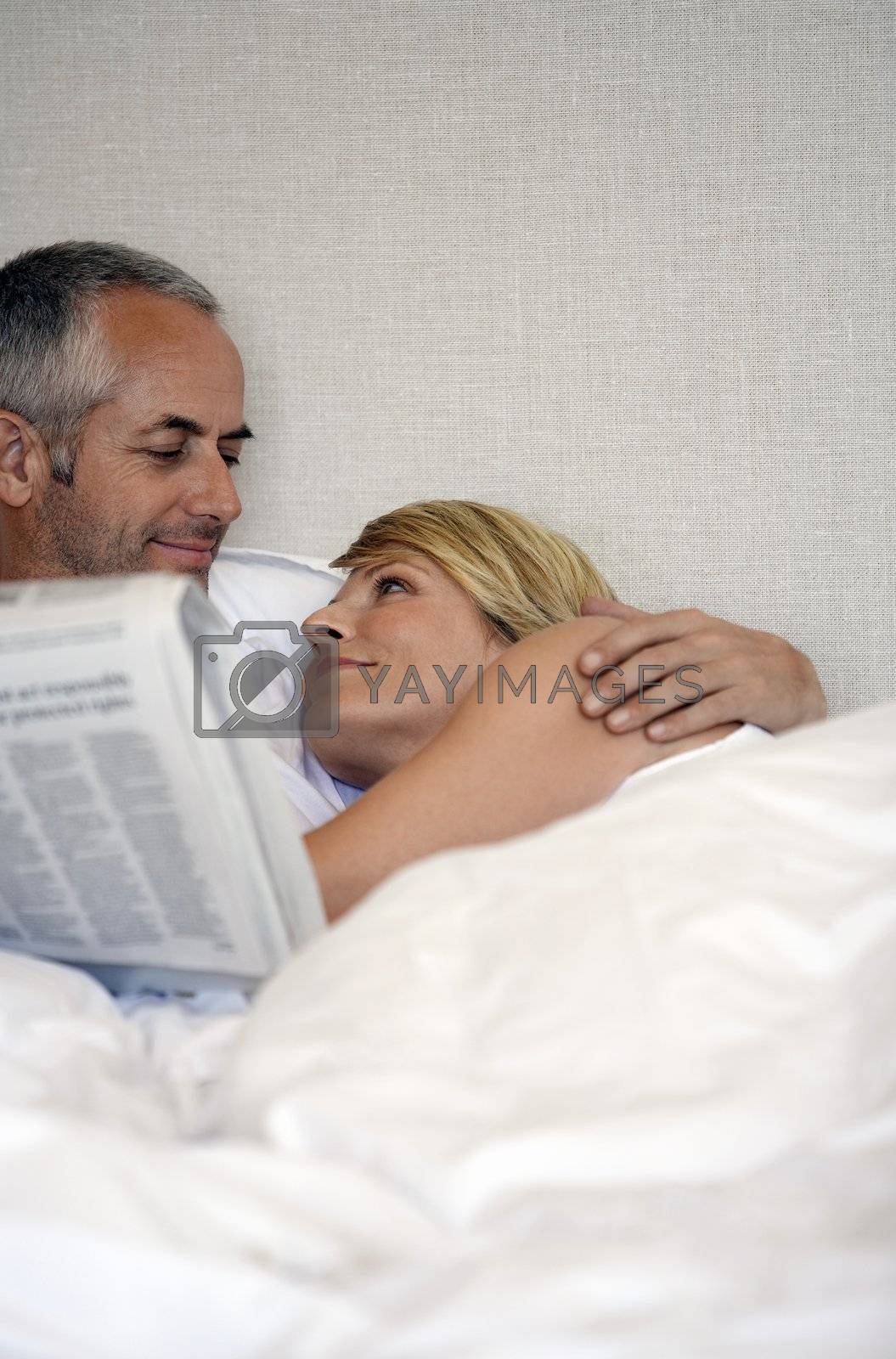Royalty free image of Couple in Bed by moodboard