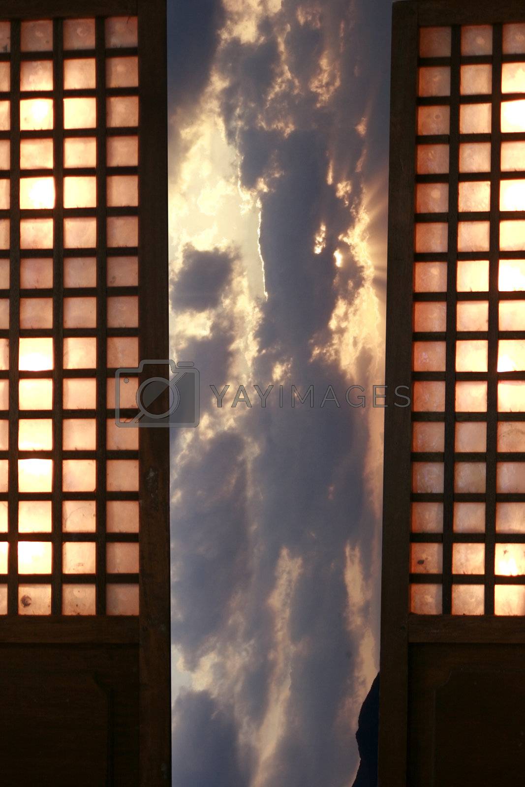 Royalty free image of Traditional Windows in Dramatic Sunset by sacatani