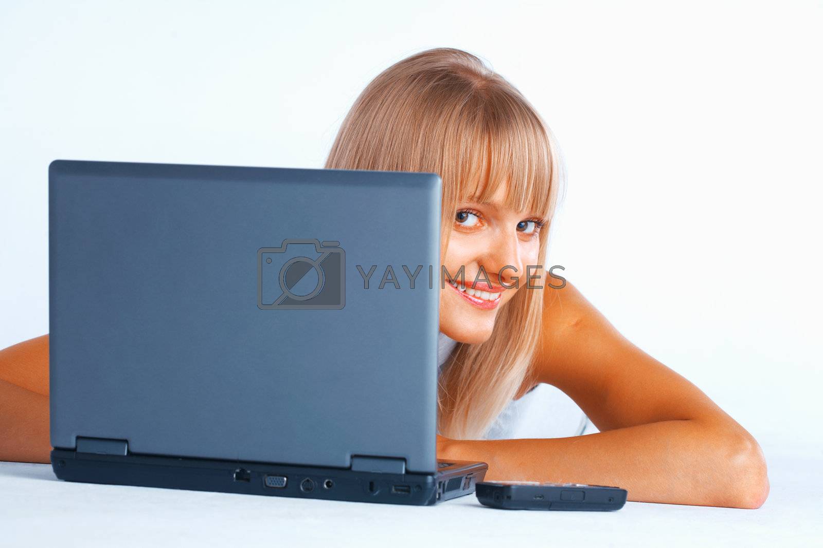 Royalty free image of Curious woman with laptop by romanshyshak