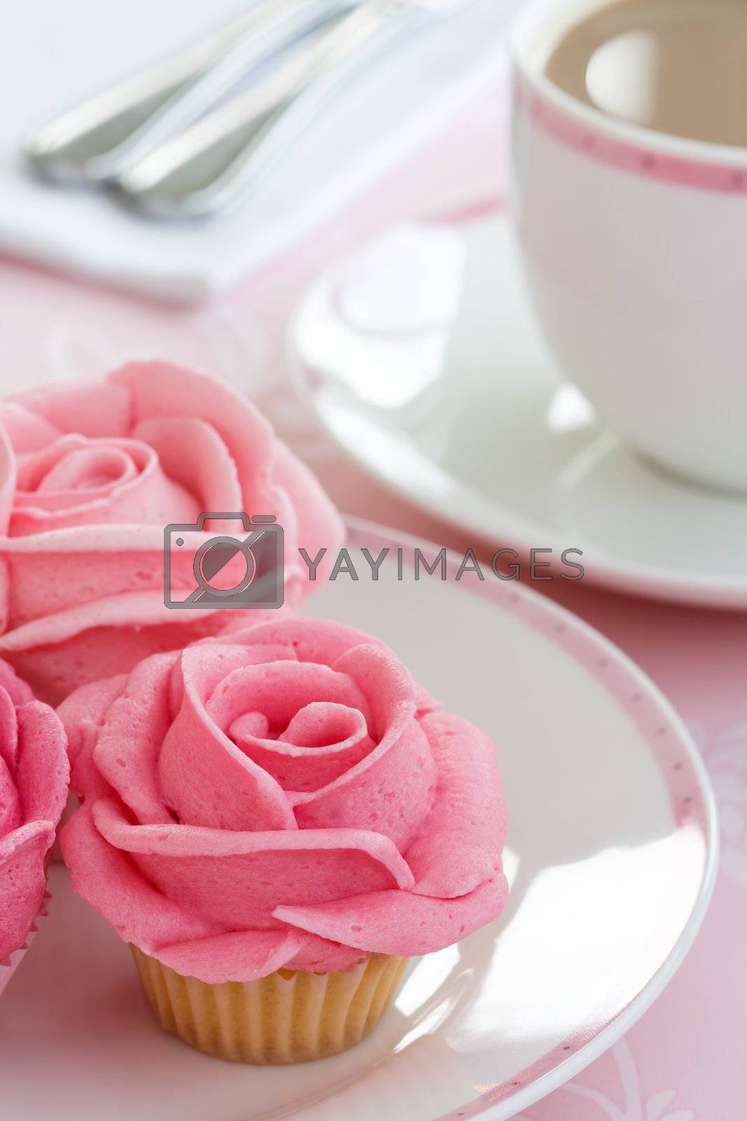 Royalty free image of Rose cupcakes by RuthBlack