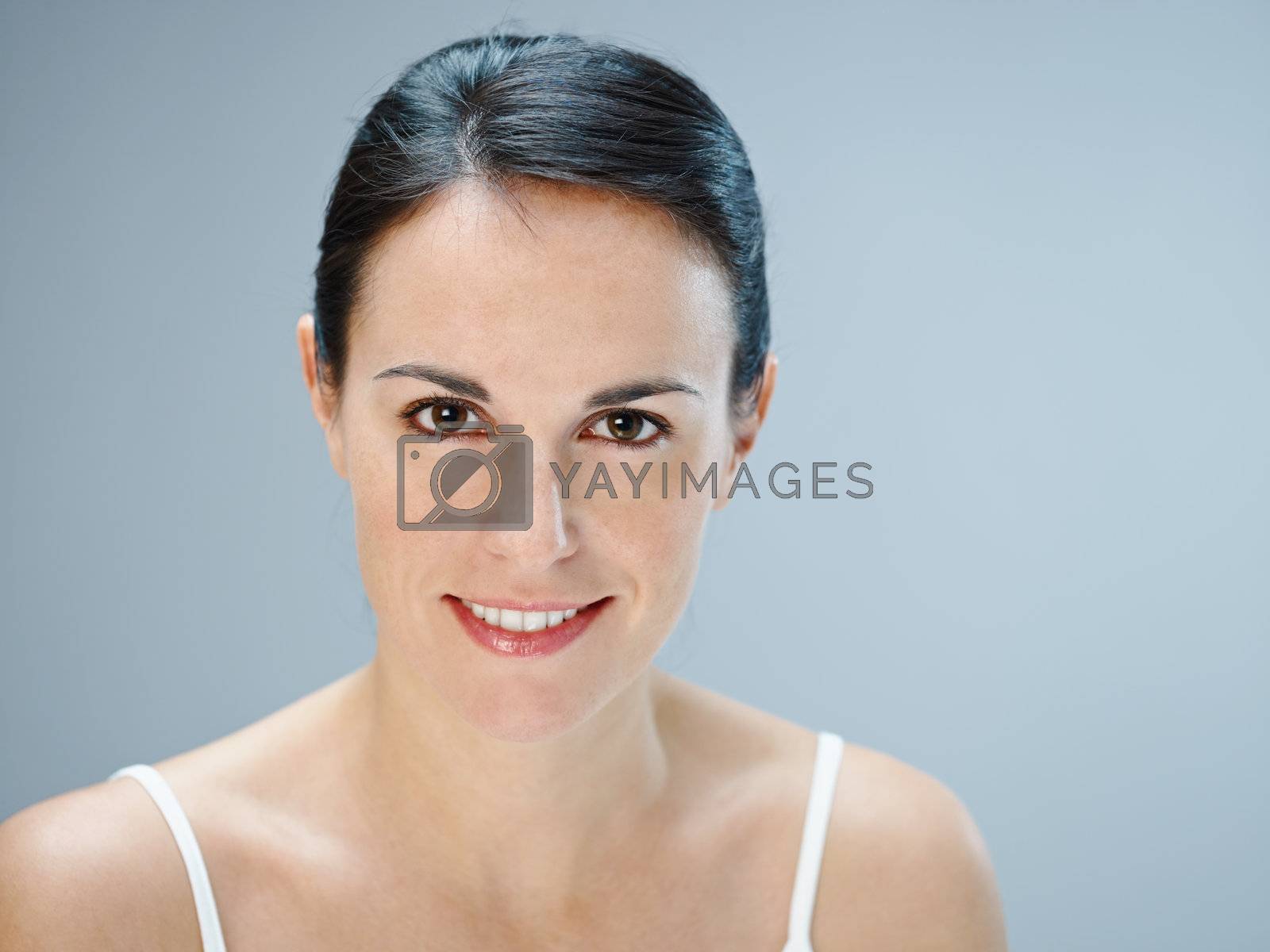 mid adult woman looking at camera. Copy space