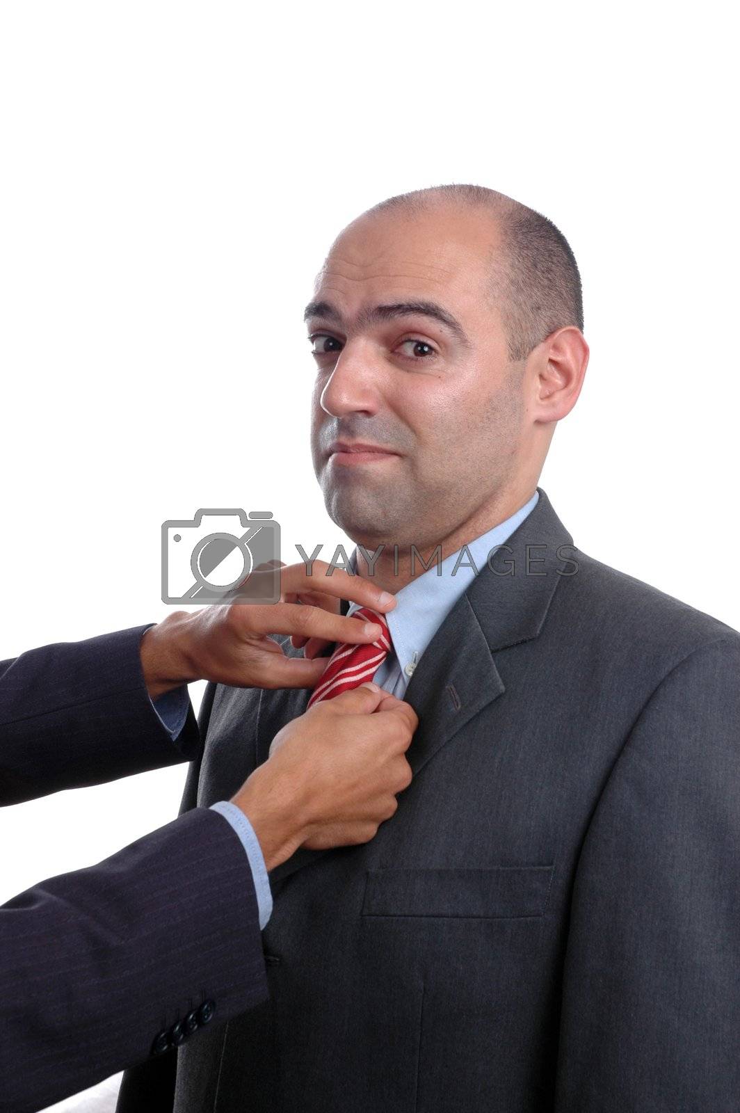 Royalty free image of two hand adjusting tie by raalves