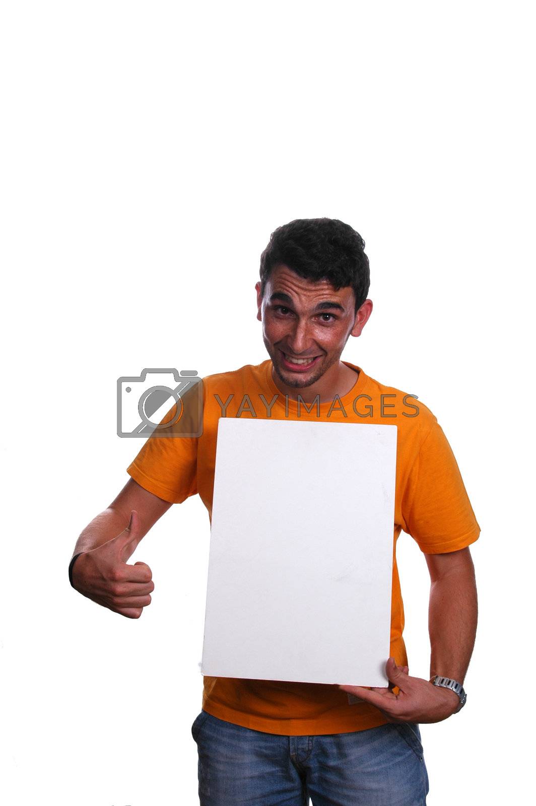 Royalty free image of young man pointing to white board by raalves