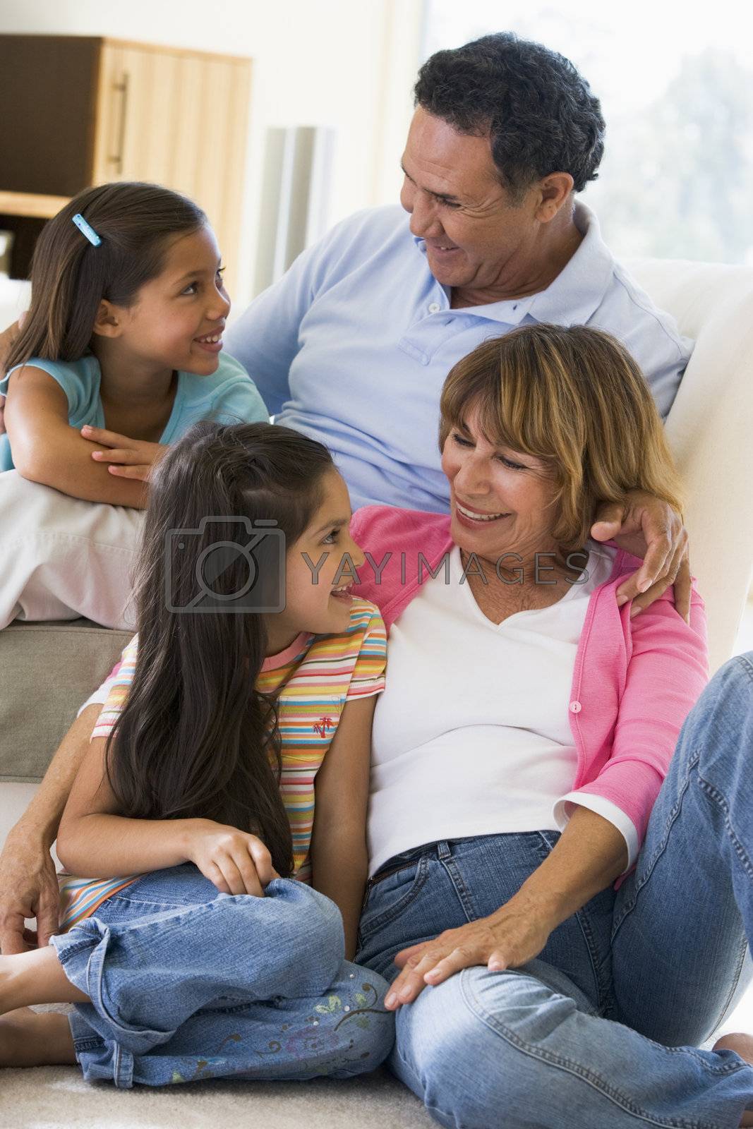 Royalty free image of Grandparents talking with grandchildren by MonkeyBusiness