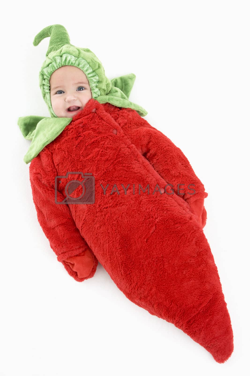 Royalty free image of Baby in pepper costume by MonkeyBusiness