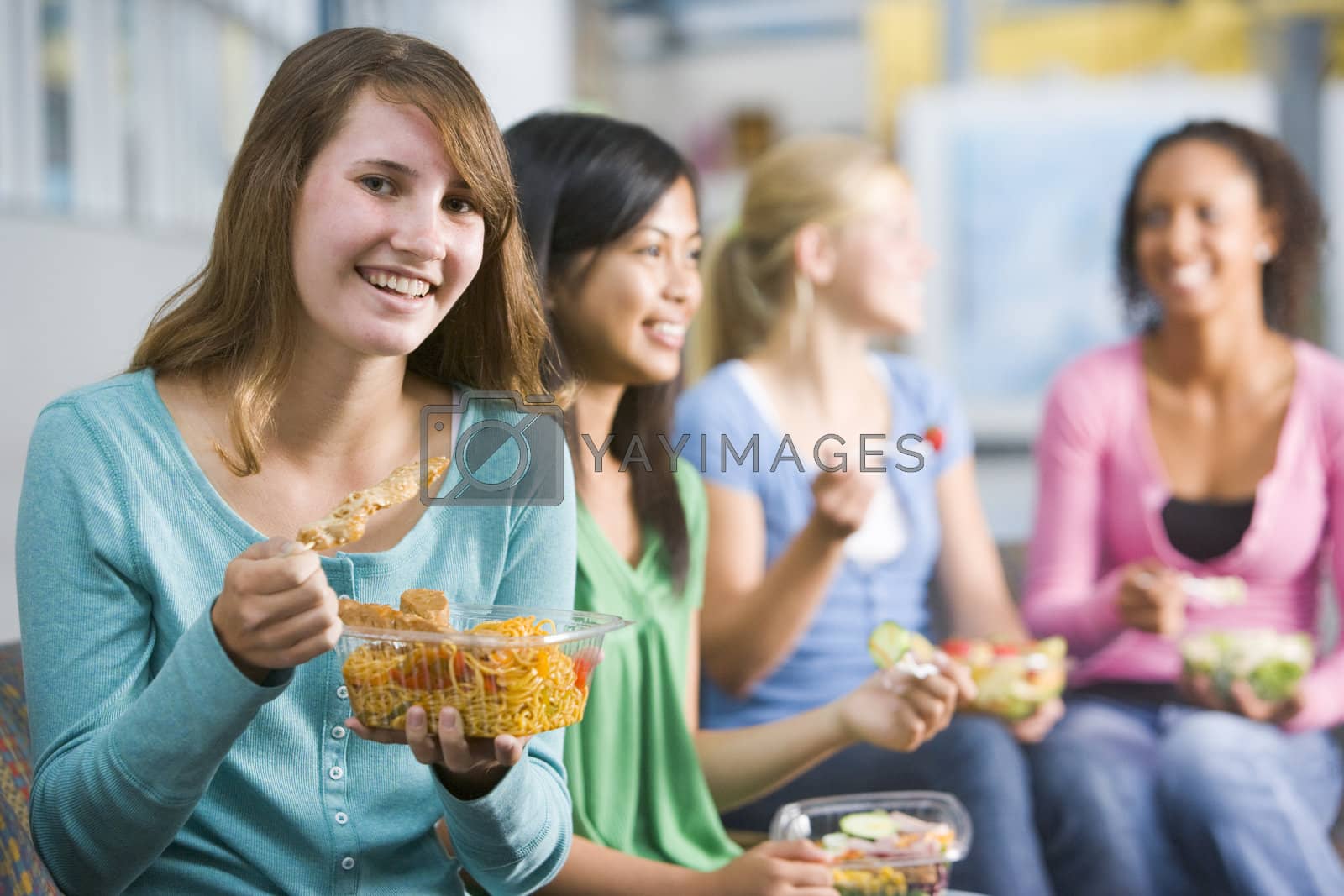 Royalty free image of Students having lunch  by MonkeyBusiness