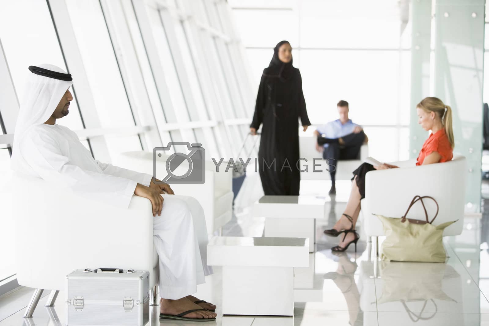 Royalty free image of Passengers waiting in airport departure lounge  by MonkeyBusiness
