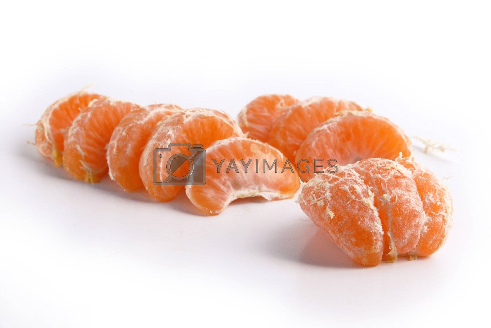 Royalty free image of Tangerine slices  by cienpies