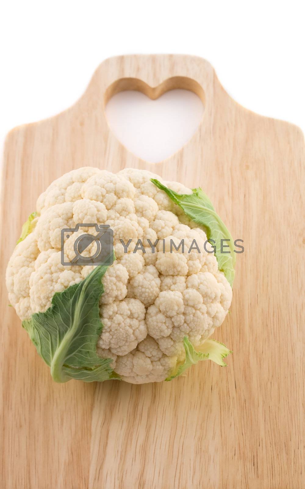 Royalty free image of Cauliflower  on cutting board by mangost