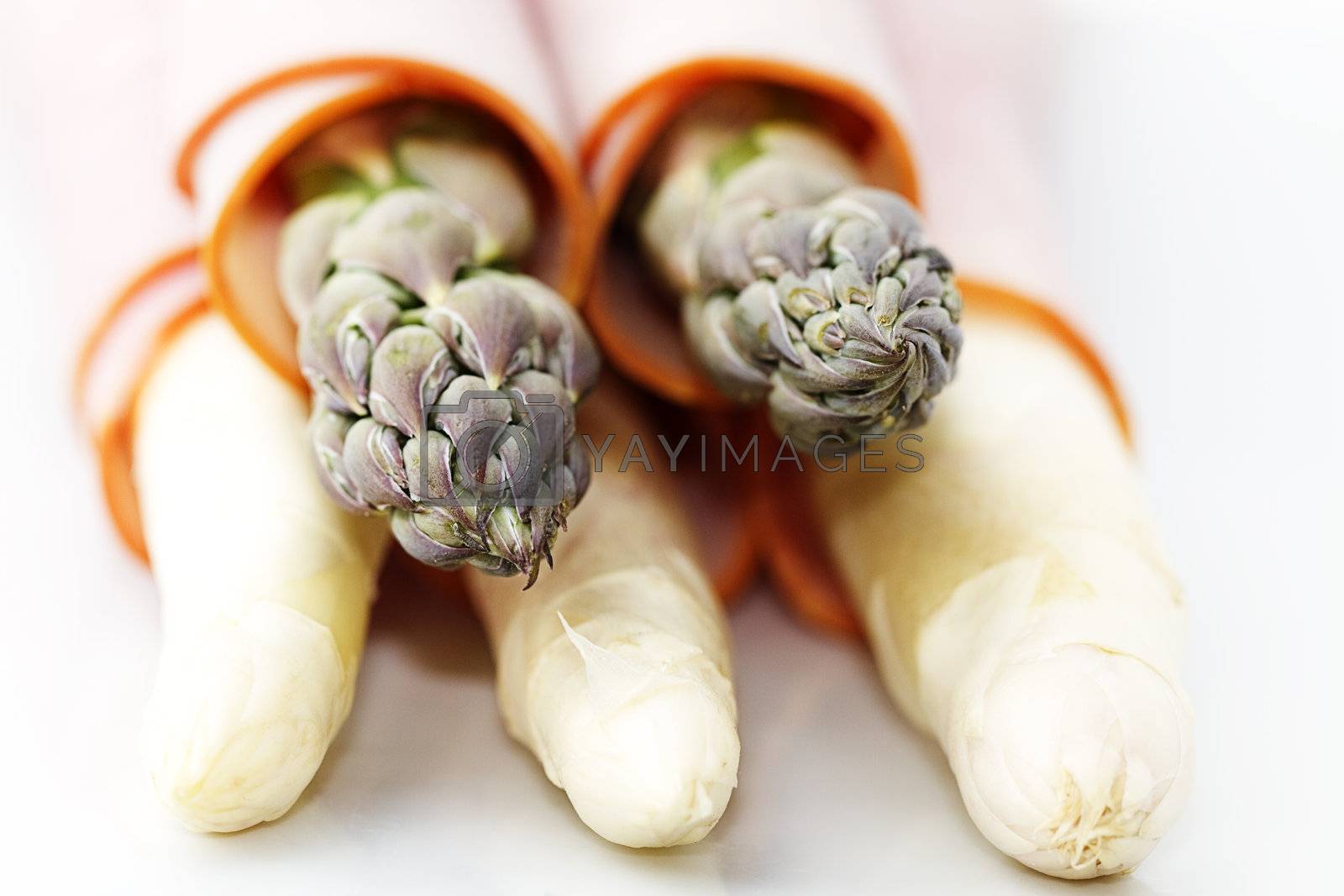 Royalty free image of macro asparagus tips ham by RobStark