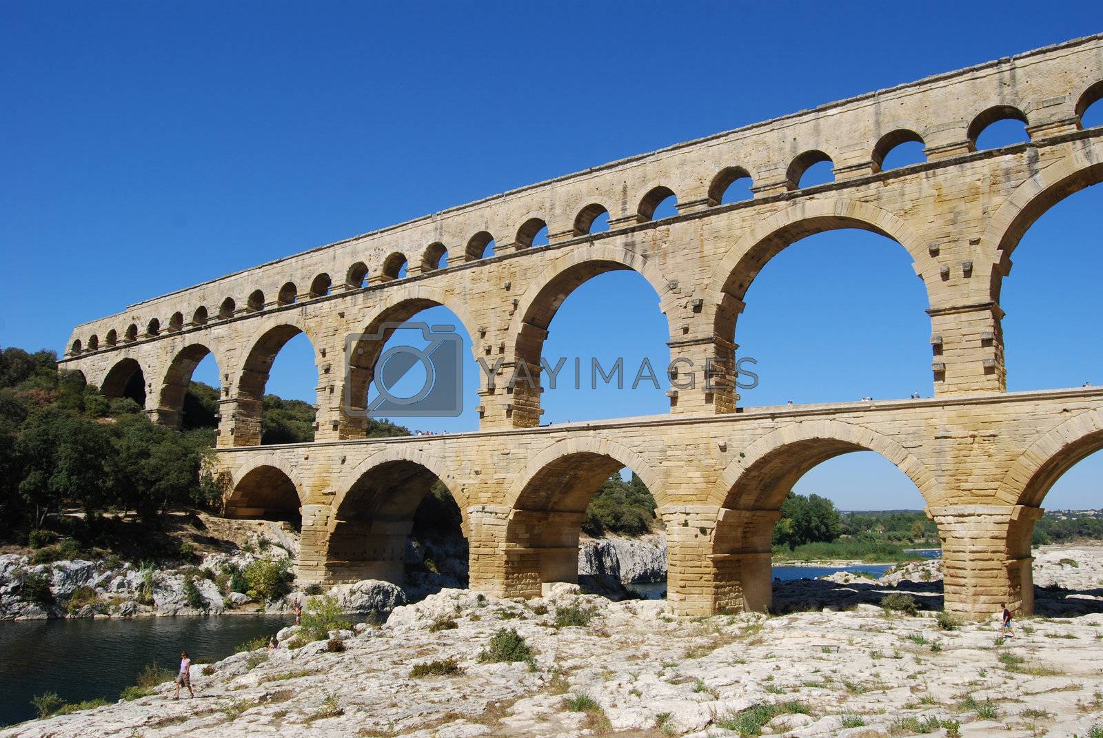 Royalty free image of Pont du gard by windmill