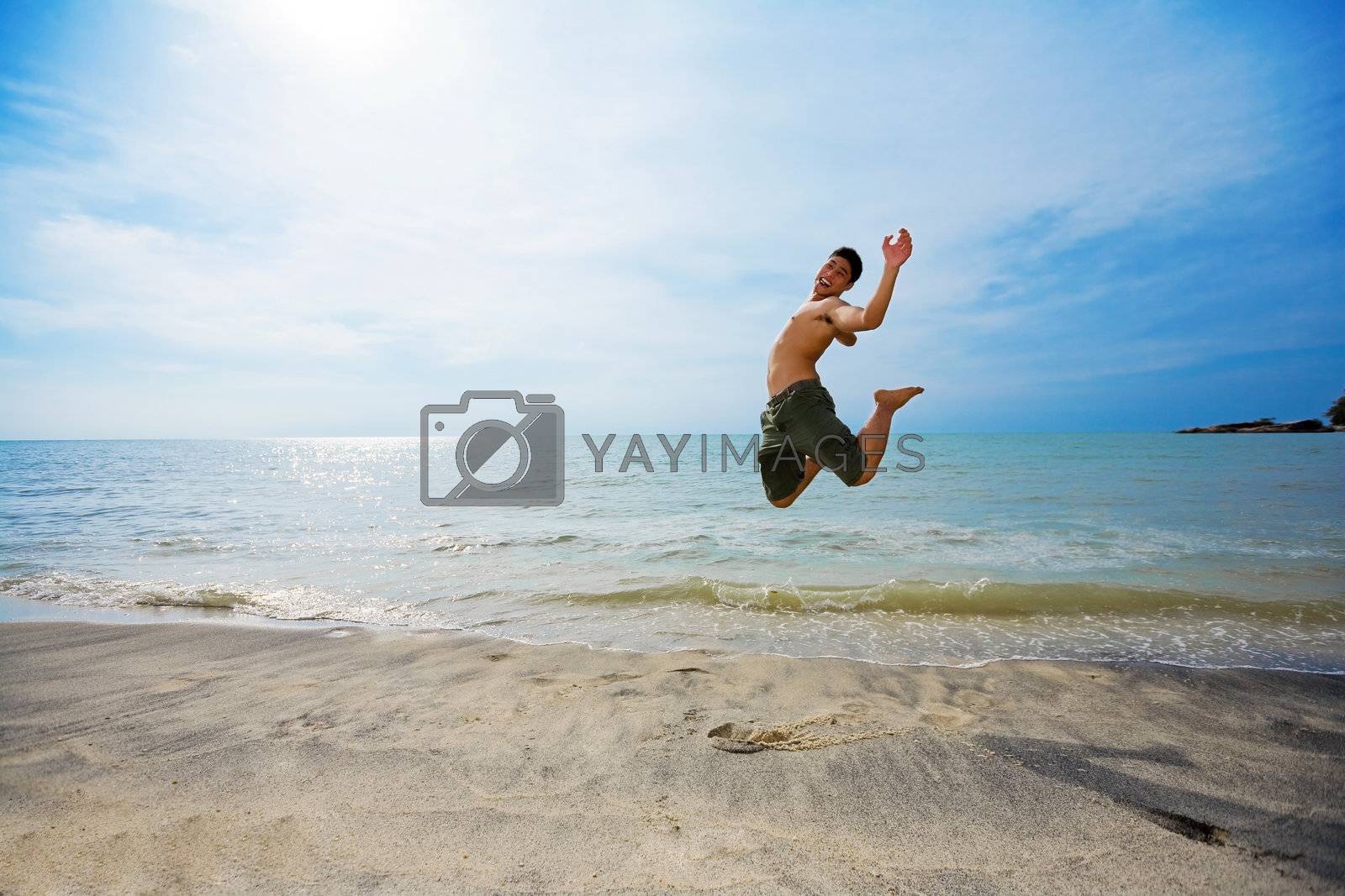 Royalty free image of excited man jumping by eyedear