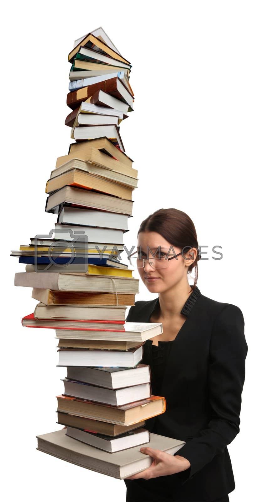 Royalty free image of girl holding a very large pile of books by skutin